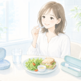 外食中のマウスピース矯正のつけ外しをイメージした清潔感のあるイラスト